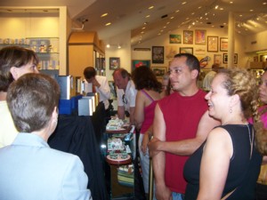 Shoppers examine the Olszewski Gallery of Light product line.